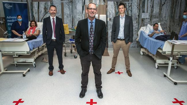 At the University of Queensland a team led by (from left) Trent Munro, Paul Young and Keith Chappell are testing a COVID-19 vaccine based on their research work, underlining the value of Australia’s researchers.