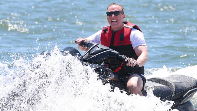 Premier Steven Miles arrives on Jet Ski to Southport on the last day of the Queensland Election campaigning ahead of Saturdays Election Day. Pics Adam Head