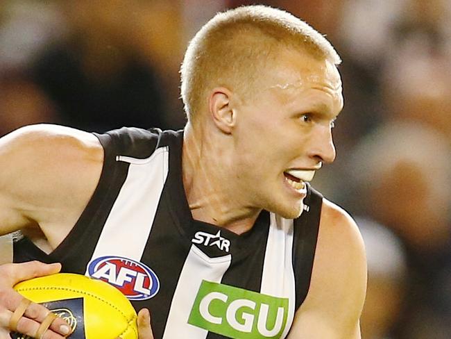 AFL Round 5. Carlton v Collingwood at the MCG. Jack Frost charges out of defence . Pic: Mchael Klein