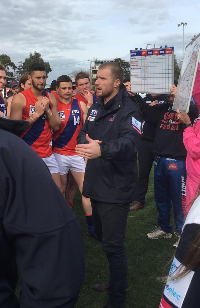 Coburg coach Leigh Adams at the quarter-time huddle.