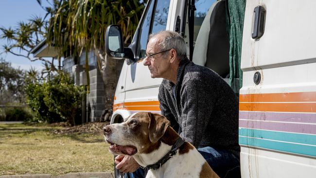 Graeme Aitken lives with his dog Duke in a van at Burleigh Beach. Picture: Jerad Williams