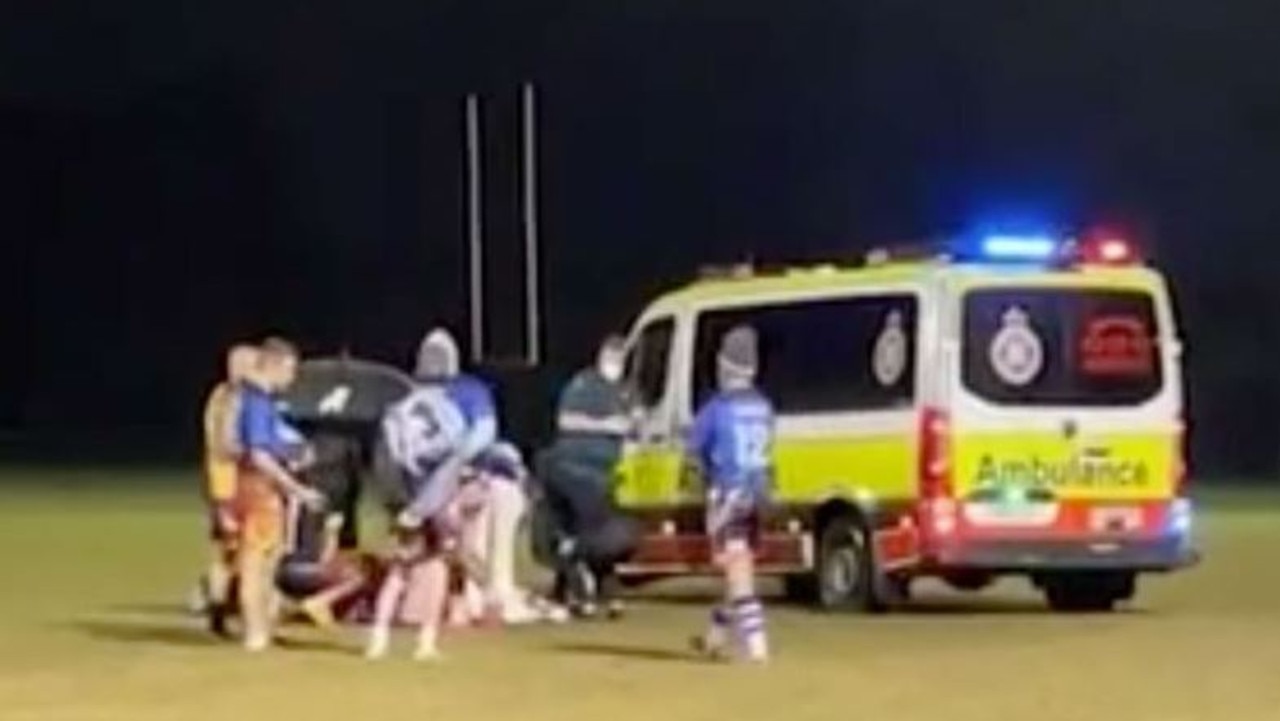 Emergency services treat Mr Fernie on the Oztag field. Picture: 9 News