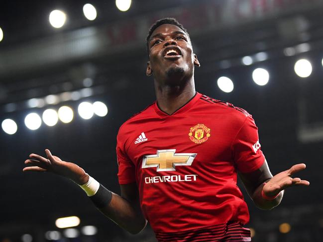 MANCHESTER, ENGLAND - DECEMBER 30: Paul Pogba of Manchester United celebrates as he scores his team's second goal during the Premier League match between Manchester United and AFC Bournemouth at Old Trafford on December 30, 2018 in Manchester, United Kingdom. (Photo by Michael Regan/Getty Images)