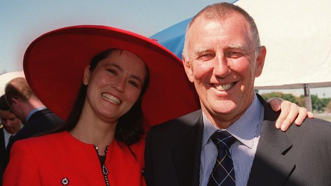 John Singleton and wife Julie Martin during Derby Day at Randwick.