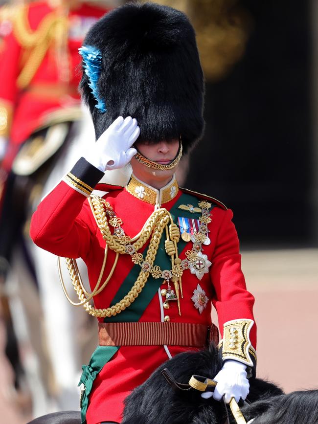 Prince William salutes during the Trooping the Colour parade at Buckingham Palace in London on Thursday night. Picture: Getty Images