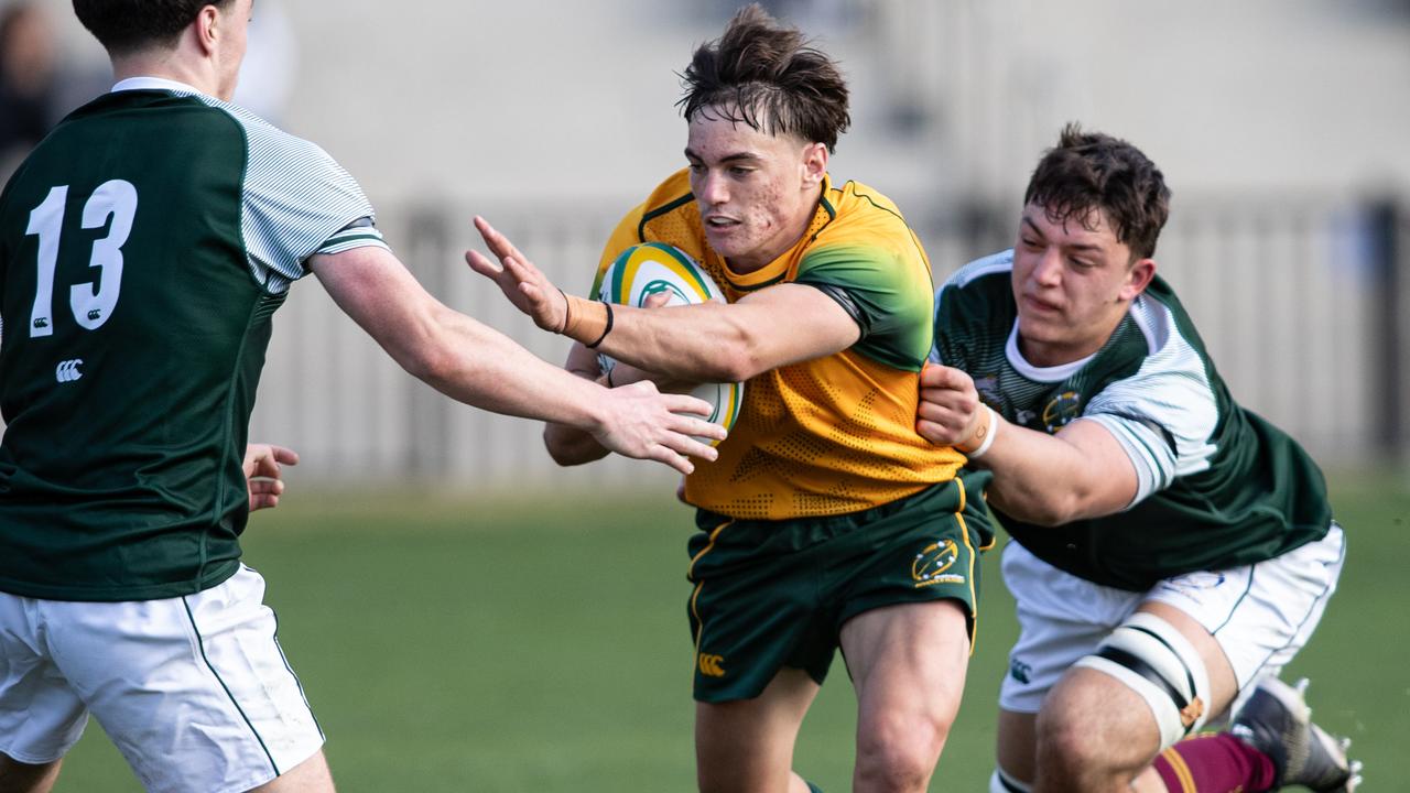 23/09/23. News Local, Sport, Wahroonga, NSW, Australia. Pictures from the Australian Schoolboys v Australian Barbarians rugby match at Know Grammar School in Wahroonga. AustraliaÃ&#149;s Sean Weir runs into trouble. Picture: Julian Andrews