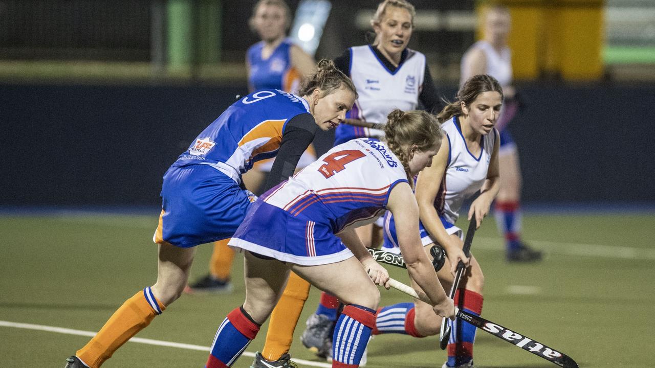 Alex Young for Newtown and Jessica Kibble for Rangeville. A1 Women , Toowoomba Hockey grand final. Newtown vs Rangeville. Saturday, September 10, 2022. Picture: Nev Madsen.
