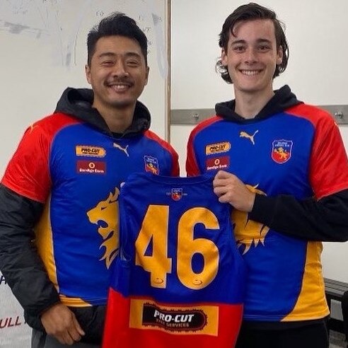 Opting for a fresh number this year, Jong presents his trademark No. 46 to Mulgrave debutant Riley Linke earlier this season. Picture: Mulgrave FC