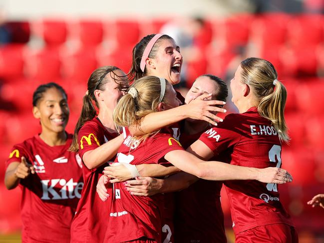 ADELAIDE, AUSTRALIA - MAY 04: Erin Healy of Adelaide United scores the equaliser  celebrating with team mates during the First Leg of the A-League Women's Semi Final between Adelaide United and Melbourne Victory at Coopers Stadium, on May 04, 2025, in Adelaide, Australia. (Photo by Sarah Reed/Getty Images)