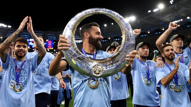 Alex Brosque with the A-League championship trophy. Picture: Getty Images