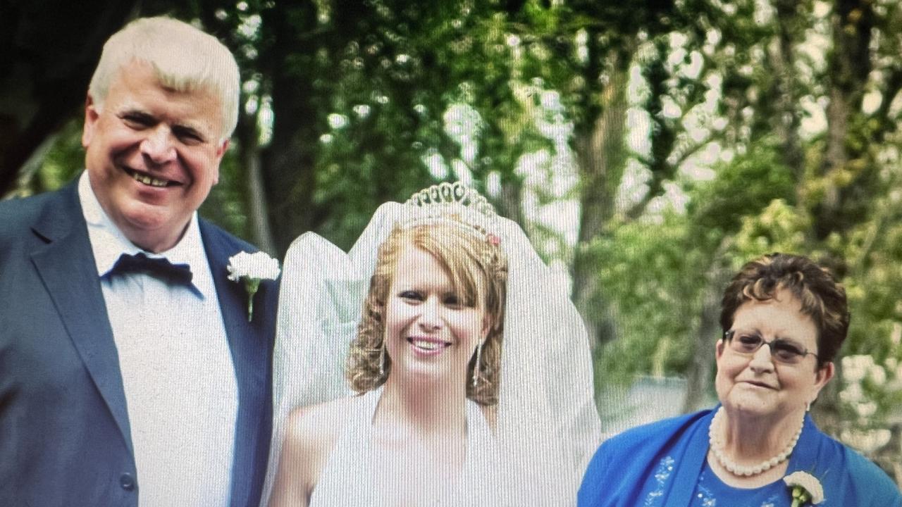 Andrew and Christine Kinna with their daughter Tracey on her wedding day. Picture: Supplied