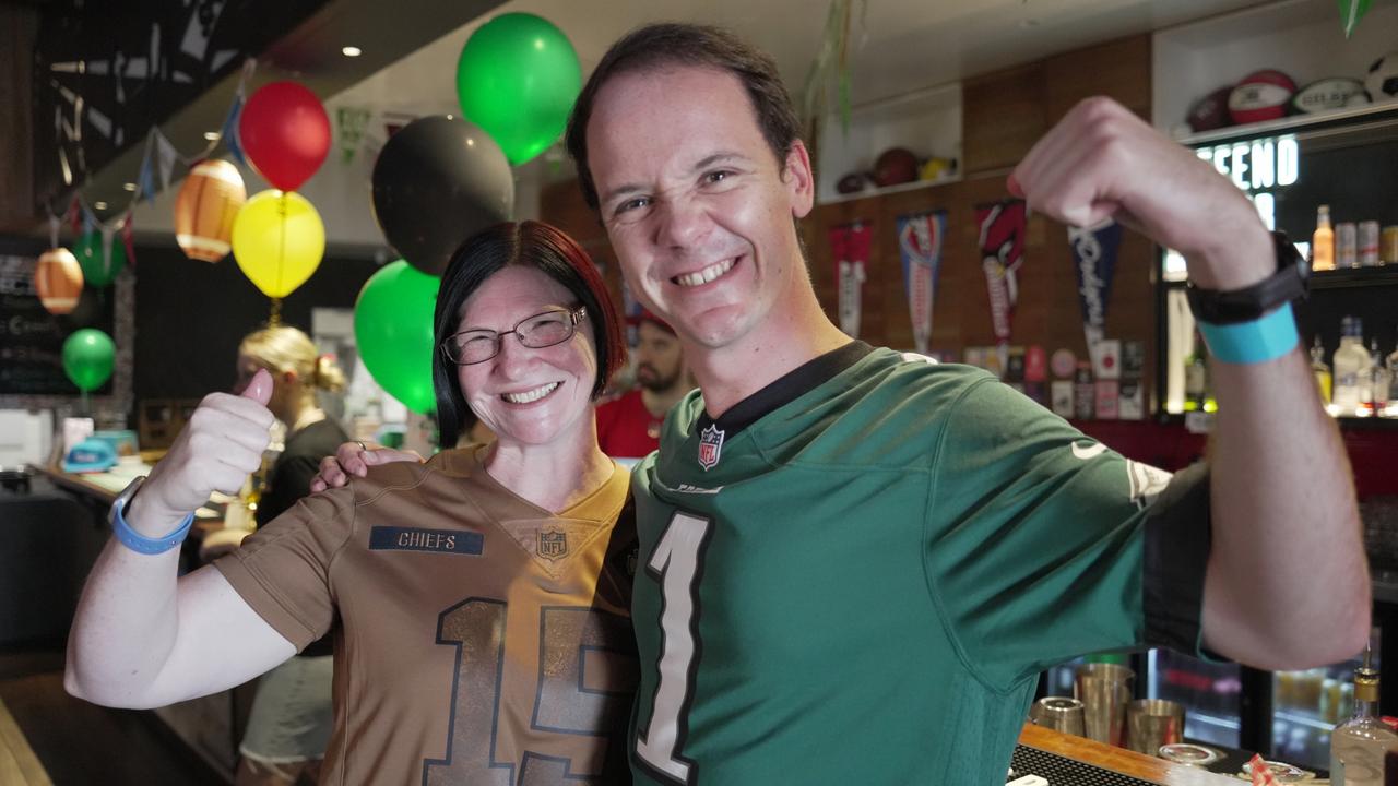 Enjoying the Super Bowl party at Tailgate Sports Bar in the Toowoomba CBD are Shay Scott and Peter Sanders.