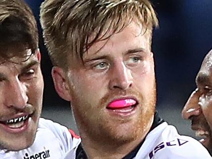 GOLD COAST, AUSTRALIA - AUGUST 25:  Cameron Munster of the Storm celebrates a try during the round 24 NRL match between the Gold Coast Titans and the Melbourne Storm at Cbus Super Stadium on August 25, 2018 in Gold Coast, Australia.  (Photo by Chris Hyde/Getty Images)