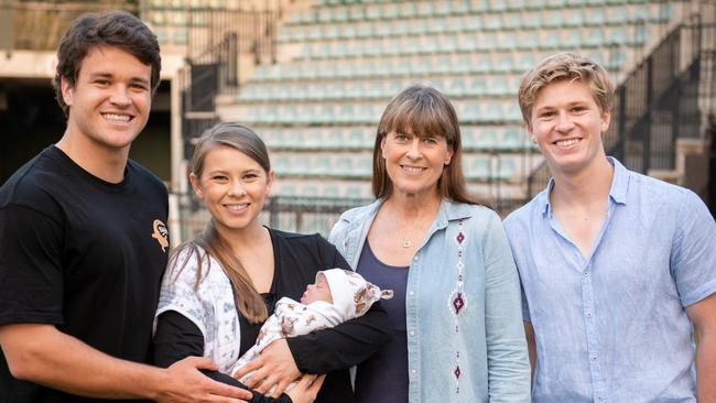 Terri Irwin photographed with her family – Chandler, Bindi (who is holding Grace), and Robert (left to right).