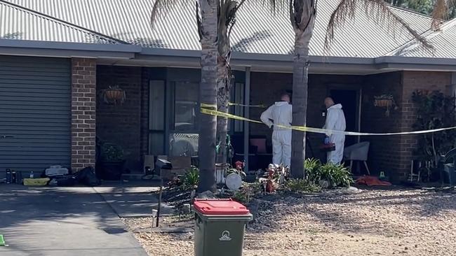 Police Forensics units at the scene of a fatal stabbing at Paralowie, Adelaide. Picture: SA Police