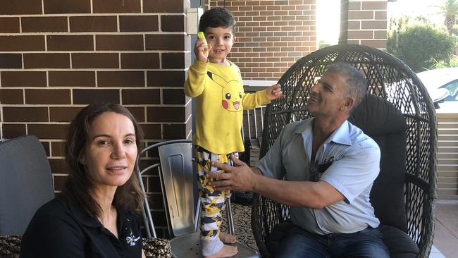 Rhonda and George Ishac with his son Noah at their Westmead home.