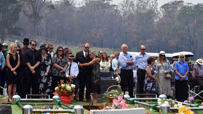 Renee Salway (centre) during the funeral of her husband Patrick and father-in-law Robert Salway, who died trying to protect their property in the farming hamlet of Wandella outside Cobargo. Picture: Getty