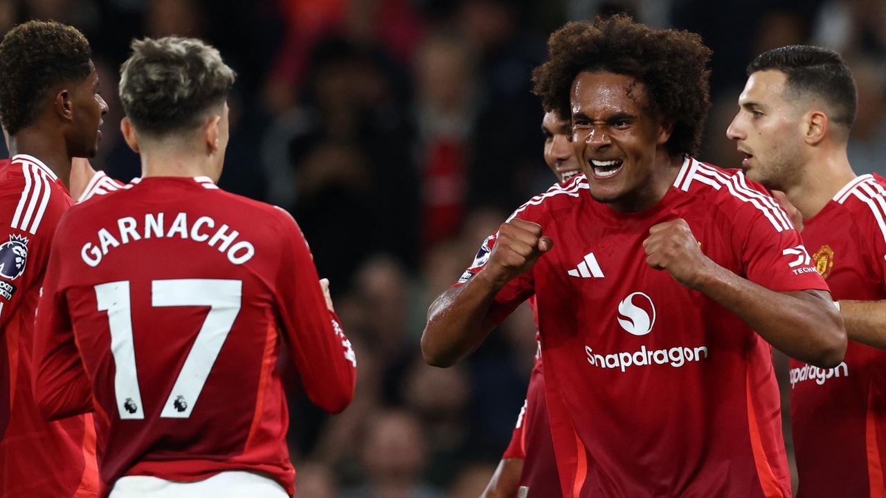 Joshua Zirkzee (R) celebrates his match-winning goal. (Photo by Darren Staples / AFP)