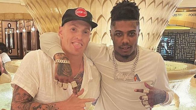 Former Brisbane Lions star Mitch Robinson alongside US rapper Blueface who was arrested on an attempted murder charge. Source: Mitch Robinson