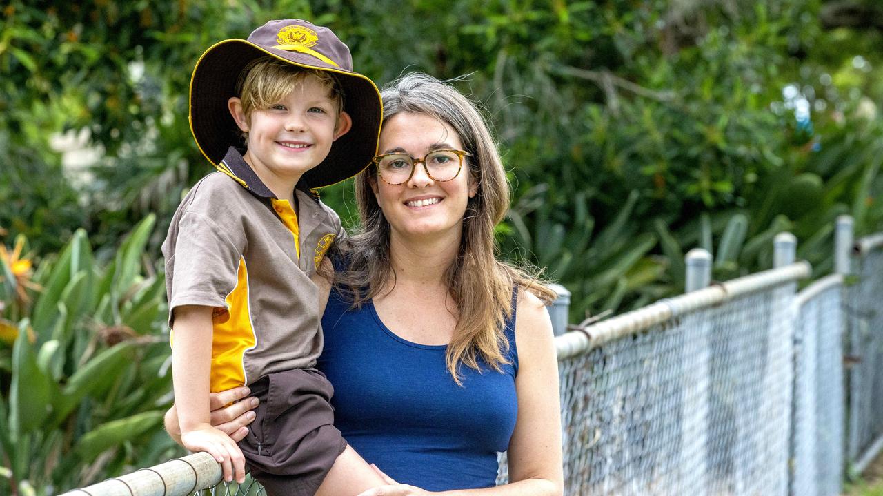 Sarah Harpham with five-year-old Clancy at Wilston State School. Some parents camp out to ensure their child secures a place. Picture: Richard Walker