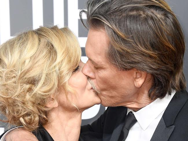 BEVERLY HILLS, CA - JANUARY 07: Actors Kyra Sedgwick (L) and Kevin Bacon attend The 75th Annual Golden Globe Awards at The Beverly Hilton Hotel on January 7, 2018 in Beverly Hills, California.   Frazer Harrison/Getty Images/AFP == FOR NEWSPAPERS, INTERNET, TELCOS & TELEVISION USE ONLY ==