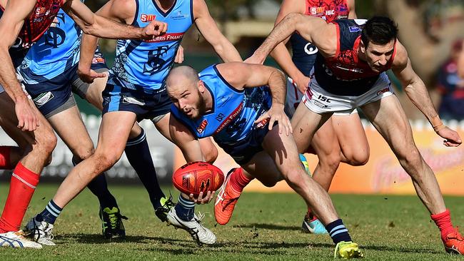 Sturt's Zane Kirkwood gathers the ball against Norwood.