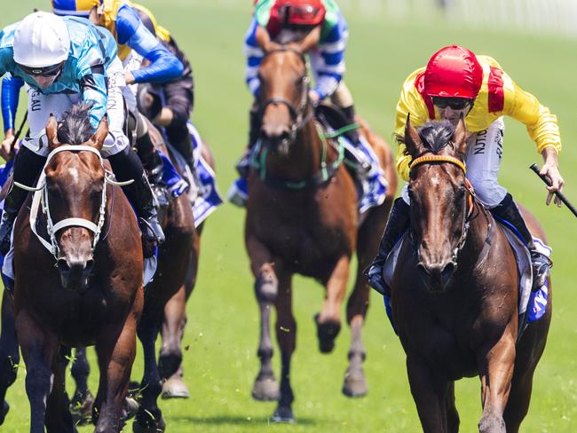 Christian Reith (red cap) on Philizzy wins the opening race. Picture: Getty Images