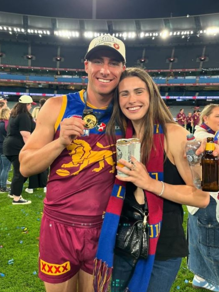 Queensland Firebirds netballer Macy Gardner celebrates on-field with Brisbane Lions' Noah Answerth. Photo: Instagram