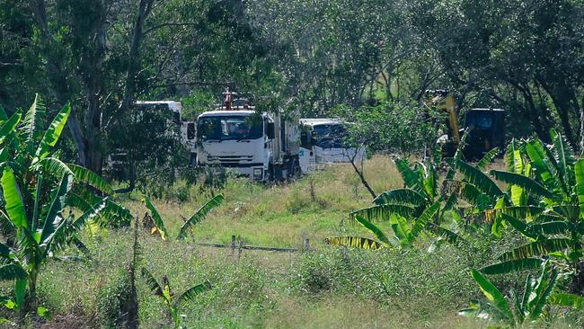 Council trucks near the Albert River. Picture: Glenn Campbell.