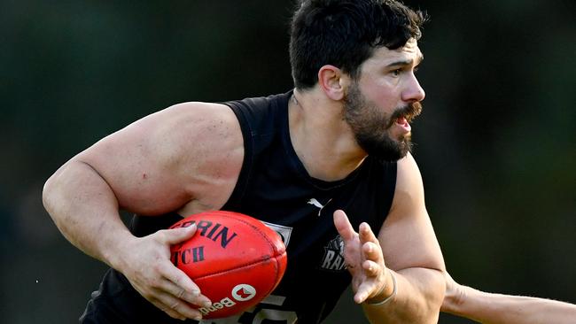 Matthew Mariani of East Burwood is tackled during the round nine EFNL Division 2 Eastland Senior Mens match between East Burwood and Lilydale at East Burwood Reserve, on June 01, 2024, in Melbourne, Australia. (Photo by Josh Chadwick)