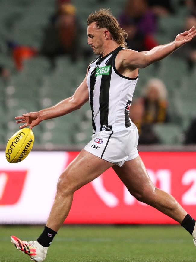 Lynden Dunn kicks a goal during match between the Crows and Magpies in 2020. Picture: Getty Images