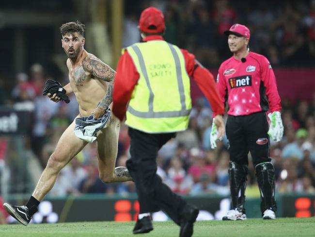 Chad Sharp’s naked dash onto the pitch during the Big Bash League match between the Sydney Sixers and the Sydney Thunder at SCG in January. Picture: Mark Kolbe/Getty Images