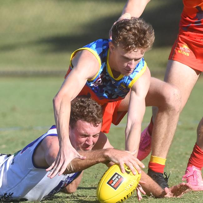 Townsville mens AFL game between Northern Beaches Suns and Thuringowa Bulldogs at Riverway. Bulldogs Joel Newman and Suns Alex Trueman. Picture: Evan Morgan