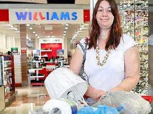 Melanie Costa from Gracemere shows her trolley full of groceries from Coles. Picture: Allan Reinikka 