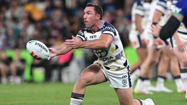 Reece Robson of the Cowboys passes the ball during the round nine NRL match between the New Zealand Warriors and North Queensland Cowboys at Suncorp Stadium on May 03, 2025, in Brisbane, Australia. (Photo by Bradley Kanaris/Getty Images)