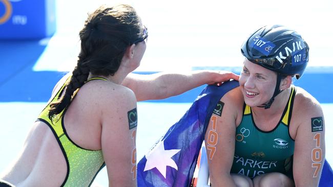 Lauren Parker (right) after winning a bronze medal at her first Commonwealth Games last year.