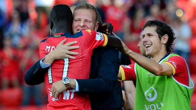 Former Adelaide United coach Josep Gombau celebrates a goal with ex-Reds winger Awer Mabil in 2014. Picture: Mark Brake