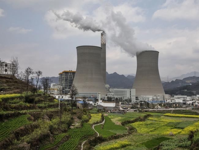 LIUZHI COUNTY, CHINA - FEBRUARY 7: A newly built Chinese state-owned coal fired power plant is seen on February 7, 2017 in Liuzhi County, Guizhou province, southern China.  A history of heavy dependence on burning coal for energy has made China the source of nearly a third of the world's total carbon dioxide (CO2) emissions, the toxic pollutants widely cited by scientists and environmentalists as the primary cause of global warming. China's government has fast-tracked deadlines to reach the country's emissions peak, and data suggest the country's coal consumption is already in decline. (Photo by Kevin Frayer/Getty Images)