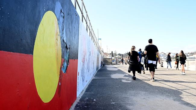 The Aboriginal flag is painted on the promenade at Bondi Beach. Picture: NCA NewsWire / Jeremy Piper