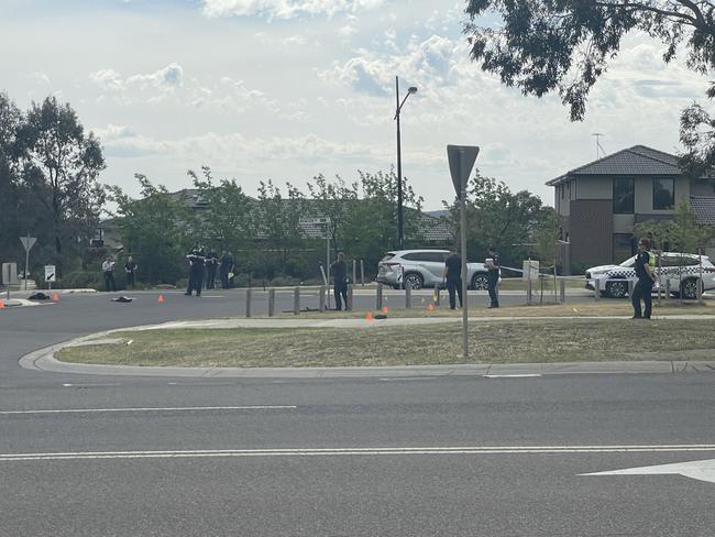 Police at the intersection of Plumpton St and Melton Hwy after the crash. Picture: Himangi Singh