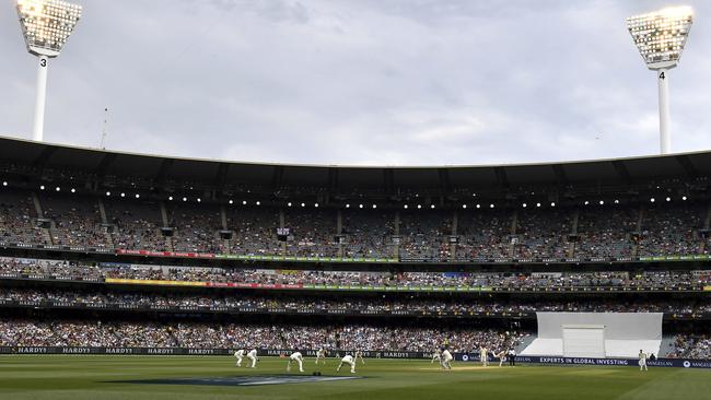 The lights come on at the Melbourne Cricket Ground. Picture: AP.