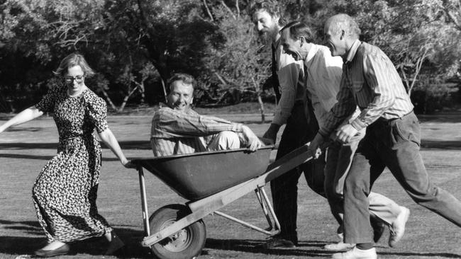 ABC's radio 5AN Talkback Gardening program team, from left, Julie Roach, Jon Lamb (in wheelbarrow), Brian Moore, John Fossey and Bruce Morphett in 1990.