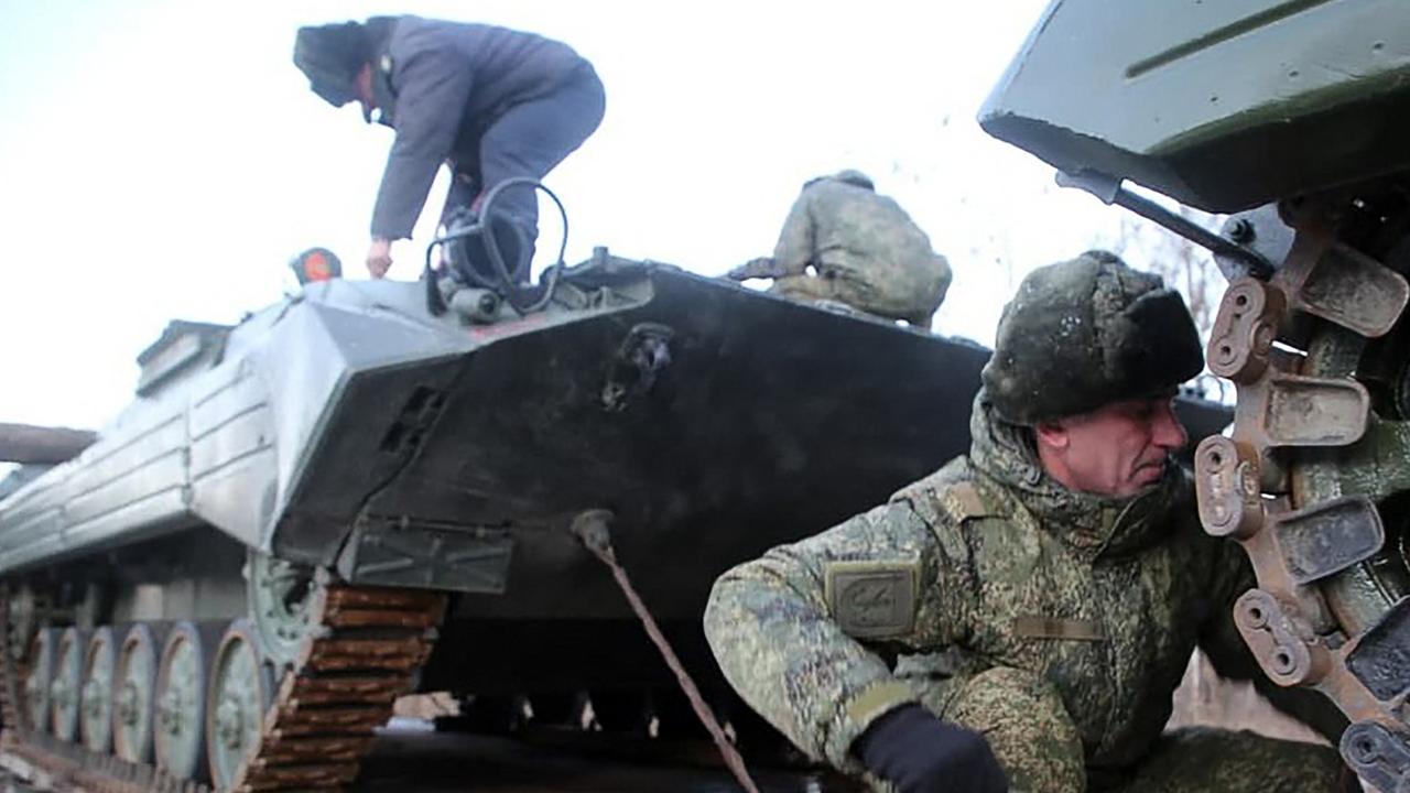 Russian servicemen preparing military vehicles to unload from a troop train for the joint drills in Belarus on January 18, 2022. Picture: Ministry of Defence Republic of Belarus/AFP