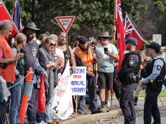 FEDERAL ELECTION TEAM 2022. Prime Minister Scott Morrison visits the Governor General at Yarralumla, Canberra on Sunday April 10th to set a date for the federal election. Protestors wait for the PM outside the gates of Government House. Picture: Toby Zerna