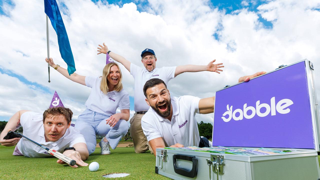 Josh Mansour with Dan Pelichowski, Sarah Betteley, Simon Coughlan from Dabble at the 17th hole at Royal Queensland Golf Club in Brisbane. Picture: Josh Woning