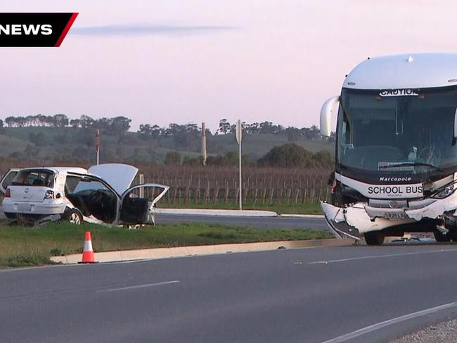 A driver is being airlifted to hospital after his car collided with a school bus at Penrice in the Barossa Valley. Picture: 7NEWS