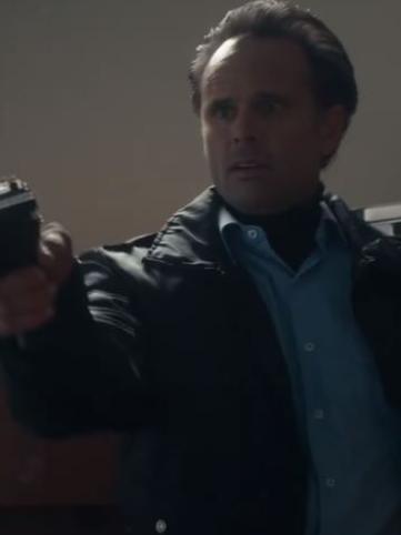 Walton Goggins plays the hit man.