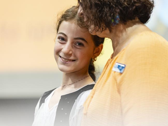 Ramona Hamad after sharing her story as an Iraqi Yazidi on school assembly during Harmony Day celebrations at Darling Heights State School. Picture: Kevin Farmer