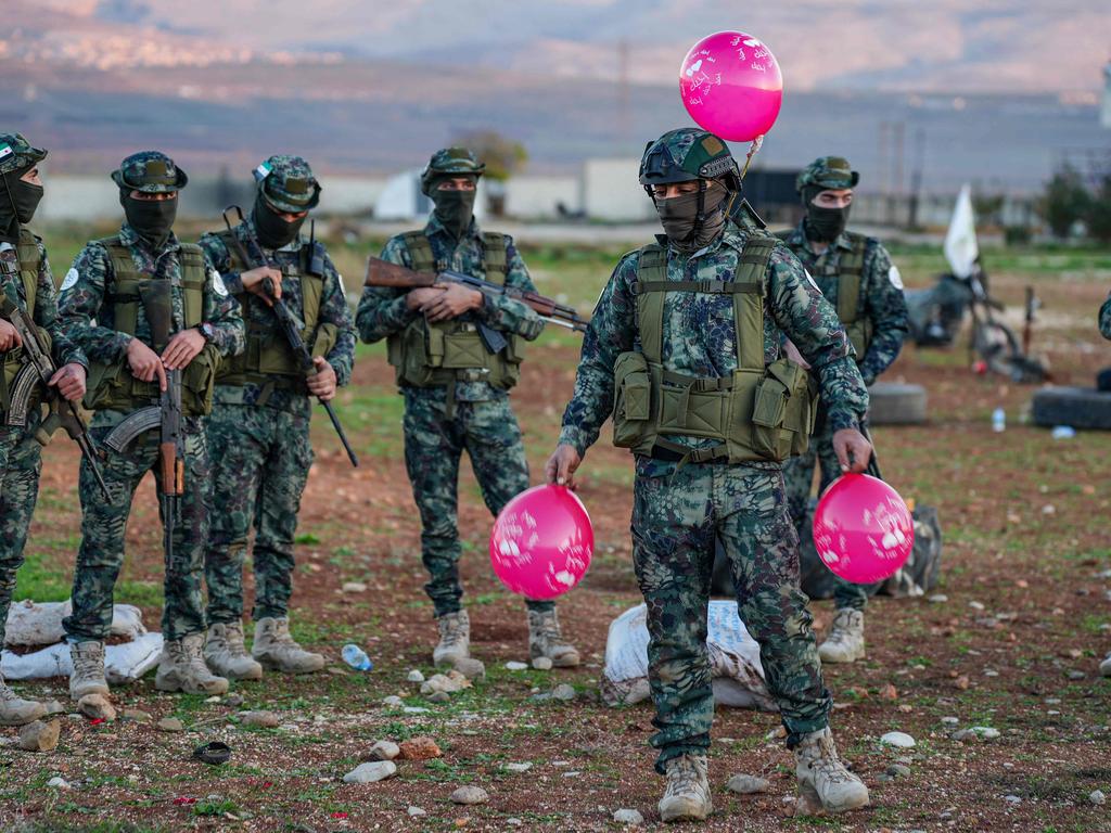 Fighters from the Syrian armed opposition train in a camp. Picture: Rami al Sayed/AFP
