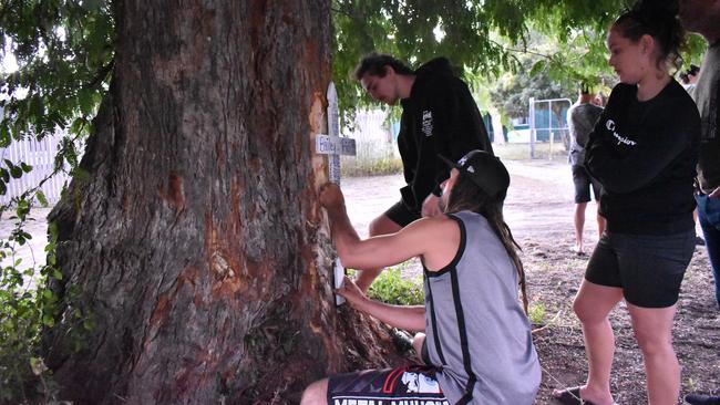 Bailey's siblings Jerricho, Kalib, and Troydon Pini organised a memorial for friends and family to sign, and placed it at the scene of Wednesday’s fatal car crash. Picture: Kirra Grimes